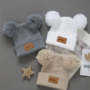 Knit hats with pom pom's